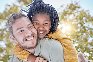 Image showing Portrait of father piggy back foster care girl in park for fun, bonding and quality time with love, care and happiness together. Adopted black kid relax with dad, diversity and happy family in garden