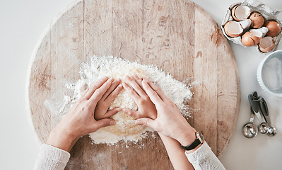 Image showing .Baking, learning and family hands of a mother and girl teaching pizza, bread or cake cooking. Above view of mama and kid hand together with care and love in a home kitchen with flour for food.