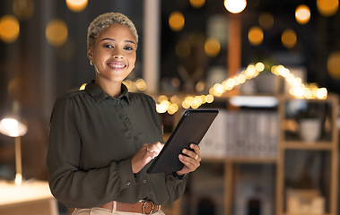 Image showing Night business, black woman and tablet, portrait and planning, website and online connection, data and innovation in office. Happy young female entrepreneur, digital tech and internet in dark agency