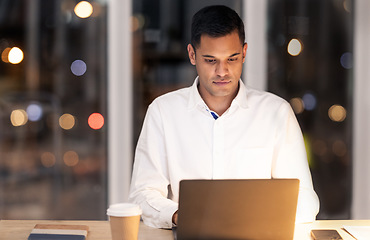 Image showing Businessman, laptop and manager in office at night for schedule, planning and management at a desk. Thinking, man and online research by inspired entrepreneur working late on goal, idea and strategy