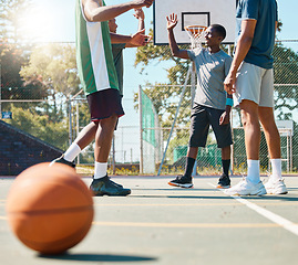 Image showing Sports, teamwork and high five with man on basketball court for summer, winner and training. Success, goals and fitness with basketball player and celebration for friends, support and community