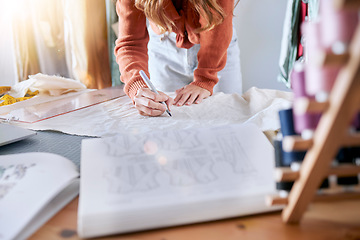 Image showing Fashion, designer and pattern with woman and fabric for planning, manufacturing and creative with clothes. Textile, workshop and retail with hands of girl in studio for boutique, tailor and sewing