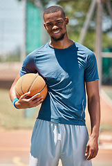 Image showing Basketball player, black man portrait and outdoor sports court training, workout and game in New York, USA. Happy professional male athlete, basketball court and ball, community playground and action