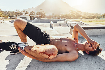 Image showing Injury, blood and knee with a topless man crying in agony after a fall or accident to damage his body. Pain, skin and medical with a shirtless male suffering a gash to his joint in an emergency