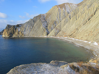 Image showing Winter beach and mountains