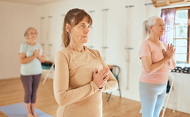 Image showing Yoga, relax and retirement wellness class for health, mindfulness and spirituality lesson. Namaste, zen and calm senior women focus together in wellbeing club for a healthy mind and body.