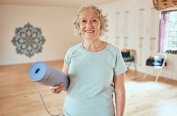 Image showing Portrait, elderly woman and mat for yoga, fitness and exercise at studio, happy and relax for cardio wellness. Smile, active senior and lady instructor in training room for mediation, peace and zen