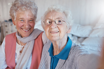 Image showing Senior women, friends and selfie with a smile, happiness and care during a visit or lifestyle in a nursing home together. Face portrait of old people happy about retirement, support and trust