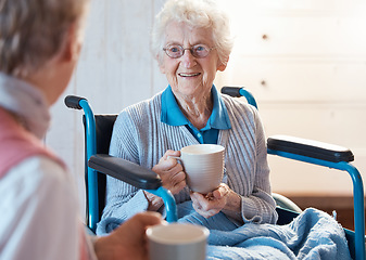 Image showing Senior, wheelchair and woman patient with morning coffee in a consulting medical conversation. Mobility disability, healthcare and retirement nursing home female happy talking to a caregiver nurse