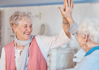 Image showing Senior women, high five and friends happy, celebration and happy together in retirement house, partnership and support. Elderly female, motivation and goal with happy smile in old age home or excited