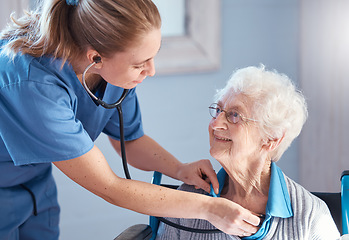 Image showing Senior woman, nurse and stethoscope to check heartbeat, breathing and health of and elderly patient during nursing home or homecare consultation. Old woman with caregiver for healthcare at hospital