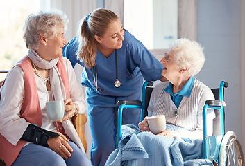 Image showing Nursing home, care and nurse with senior women doing healthcare checkup, examination or consultation. Medical, conversation and elderly woman in wheelchair consulting a doctor at retirement facility.