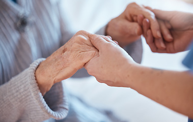 Image showing Elderly woman hands, support and holding healthcare worker for medical care or help walking. Retirement care, senior person and holding hands for volunteer caregiver service in health community