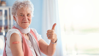 Image showing Senior woman, vaccine and covid with thumbs up in portrait, hospital and smile with plaster. Happy elderly lady, vaccination and yes hand for safety, healthcare or medical protection against covid 19