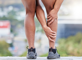 Image showing Man, fitness and legs injury on outdoor run for sports marathon, exercise emergency or wellness accident. Athlete, healthy workout and cardio runner leg pain or calf muscle care in city street