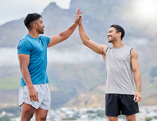 Image showing High five, man and friends for outdoor fitness in summer, sport and happy by mountain. Teamwork, support and hands together in success, wellness or workout for health, goal or training in Cape Town