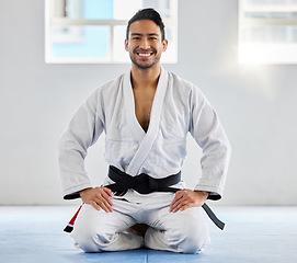 Image showing Karate, fitness and athlete, man with black belt and martial arts portrait, training and discipline with exercise. Taekwondo, combat sport and active with power and strong, sports motivation in dojo.