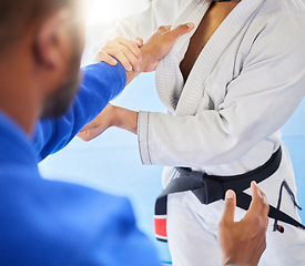 Image showing Man, closeup and karate training fight in gym, dojo and combat sport for exercise. Man, self defence and workout with black belt sensei at fitness club for body health, balance or martial arts sports
