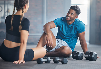 Image showing Happy couple, fitness and exercise with personal trainer and client talking about wellness, health and workout plan on gym floor. Happy indian man and woman together for training and motivation