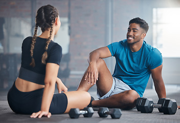 Image showing Fitness, exercise and couple talking after gym. workout while on floor for communication and conversation about health, motivation and wellness. Personal trainer man and woman together for training