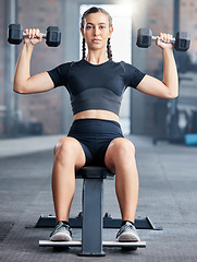 Image showing Woman, fitness and weightlifting in wellness gym for healthcare motivation and bodybuilding. Weight training, healthy muscle exercise and strong bodybuilder or sports athlete trainer in health club