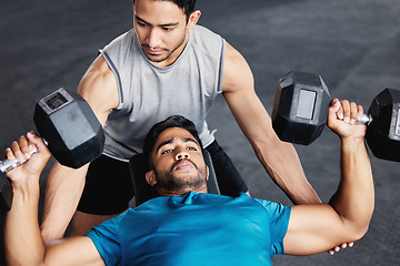 Image showing Fitness, dumbbell training and personal trainer men with support, trust and muscle help in gym together. Helping, coaching and motivation of coach for man bodybuilder challenge, exercise or workout
