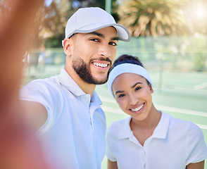 Image showing Selfie, tennis and sports with a couple on a court to take a photograph after their training or game. Portrait, fitness and sport with a man and woman tennis player posing for a picture together