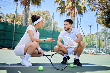 Image showing Sports, fitness and tennis team talking, speaking and planning game plan, winning strategy or teamwork discussion. Collaboration, communication and athlete tennis player on court for fitness exercise