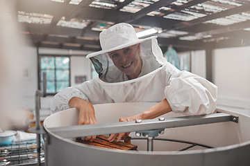 Image showing Woman, beekeeper and workshop, bee farming for honey and natural product, farm and small business owner with hive maintenance. Organic, bees and safety suit, elderly person smile in portrait.