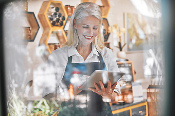 Image showing Small business, woman and tablet in honey shop for marketing, advertising or ecommerce in startup. Happy elderly female business owner with smiling working on touchscreen for online retail store