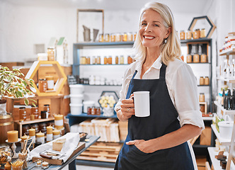 Image showing Coffee, portrait and senior small business entrepreneur standing in her retail wellness shop. Leader, owner and portrait of a professional elderly woman boss drinking cup of tea in her startup store.