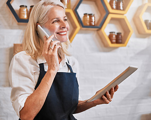 Image showing Phone call, tablet and honey with a retail woman recording an online order via mobile communication. Business, ecommerce and nectar sales with a female employee talking while working in her store