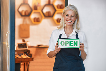 Image showing Open sign, woman and small business for honey, retail and shop with smile in portrait and happy with natural product startup business. Elderly business owner, organic and raw, store with shopkeeper.