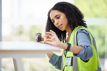 Image showing Measure tape, engineer or carpenter woman building project, furniture design or home renovation measure for construction, workshop or manufacturing with worker, contractor or builder working process