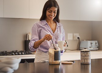 Image showing Kitchen, coffee and woman with sugar in home for cappuccino, espresso or caffeine. Tea, happy and smile of female from India in house preparing a delicious, hot and sweet beverage to relax alone.