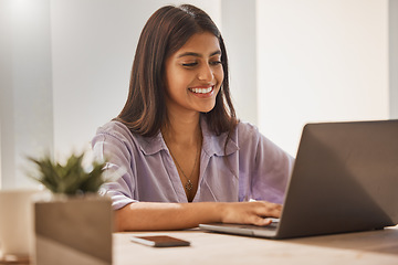 Image showing Email, typing and business woman on laptop for research, internet connection and work at home. Social network, working and remote employee with a smile for entrepreneurship with a computer at a desk