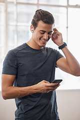 Image showing Gym, man and smartphone, music and social media connection, fitness playlist and motivation, wellness or workout. Happy athlete, mobile app and audio radio listening, technology and training exercise