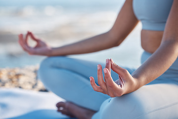 Image showing Yoga, meditation and zen hands of woman at beach for fitness, exercise and mindfulness in nature, outdoor wellness and peace. Meditate, spiritual and healing person hand sign or lotus pose by a sea