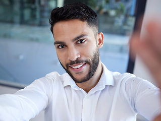 Image showing Businessman, portrait smile and selfie at the office for social media, profile or status update. Happy man employee face smiling in happiness for photo, career or new job startup at the workplace