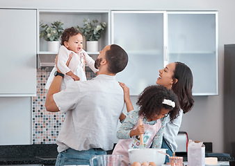 Image showing Family, children and baking with a father, mother and daughter siblings in the kitchen learning to bake. Food, cooking and love with a man, woman and girl children having fun at home together