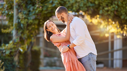 Image showing Couple, hug and love in nature park, smile and happy together with relationship and romance on outdoor date. Bonding, care and romantic, man holding woman and spending quality time outside.