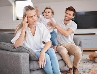 Image showing Family, stress and headache of mother on sofa with father, hyper active energy and adhd child. Tired, burnout and woman in living room with boy and dad feeling depression or anxiety in home with kid.