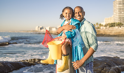 Image showing Father, child and family fishing trip at sea learning about nature and having fun on vacation in summer. Portrait of man and girl together teaching kid about fish with beach bucket and net at ocean