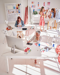 Image showing Creative business people, fashion and designer team in office working with top view. Teamwork, planning or group of employees in workshop with computer or tablet for fashion design or fabric styling