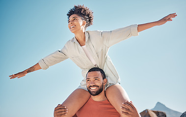 Image showing Love, happy and piggyback with couple and blue sky in nature for freedom, support and summer. Smile, vision and airplane with woman on man shoulders for vacation, bonding and affection together