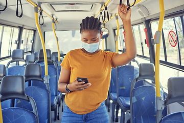 Image showing Black woman, bus transport or travel with mask for safety, protection or health from covid 19. PPE woman, smartphone and medical healthcare to stop bacteria, covid or virus in metro transportation