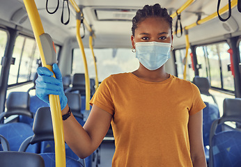 Image showing Transport, covid and portrait of black woman on bus travelling on public transport in city. Travel, commute and girl with medical gloves and face mask for health, safety and protection in pandemic