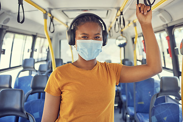 Image showing Bus travel, covid and black woman, headphones and music, podcast or radio on urban journey, transport and trip. Portrait of young traveler listening to audio, face mask and corona virus safety rules