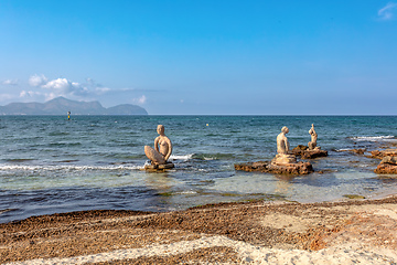 Image showing Group of sculptures, statues of people on beach in Can Picafort. Can Picafort, Balearic Islands Mallorca Spain.