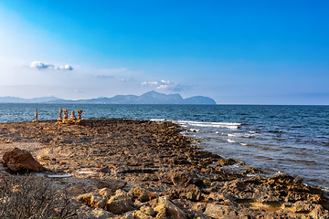 Image showing Group of sculptures, statues of people on beach in Can Picafort. Can Picafort, Balearic Islands Mallorca Spain.